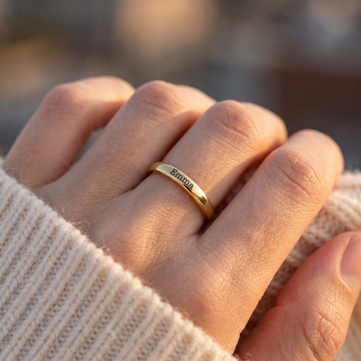 Tiny Stackable Name Ring – Gold – worn, close-up