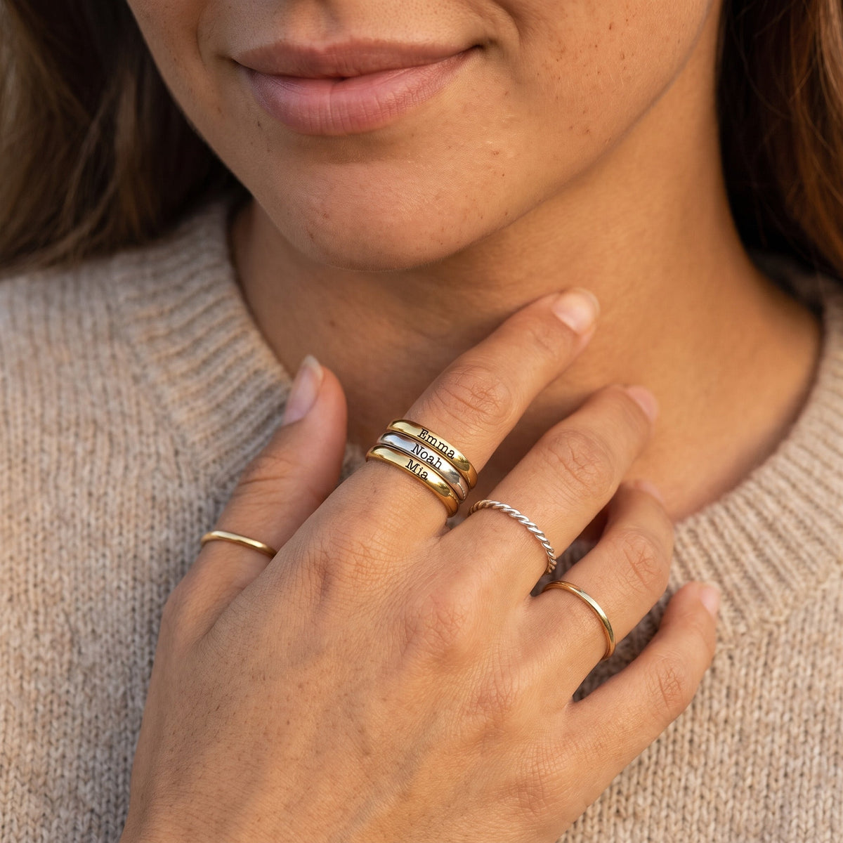 Tiny Stackable Name Ring – Gold & Silver – stacked with other rings, worn